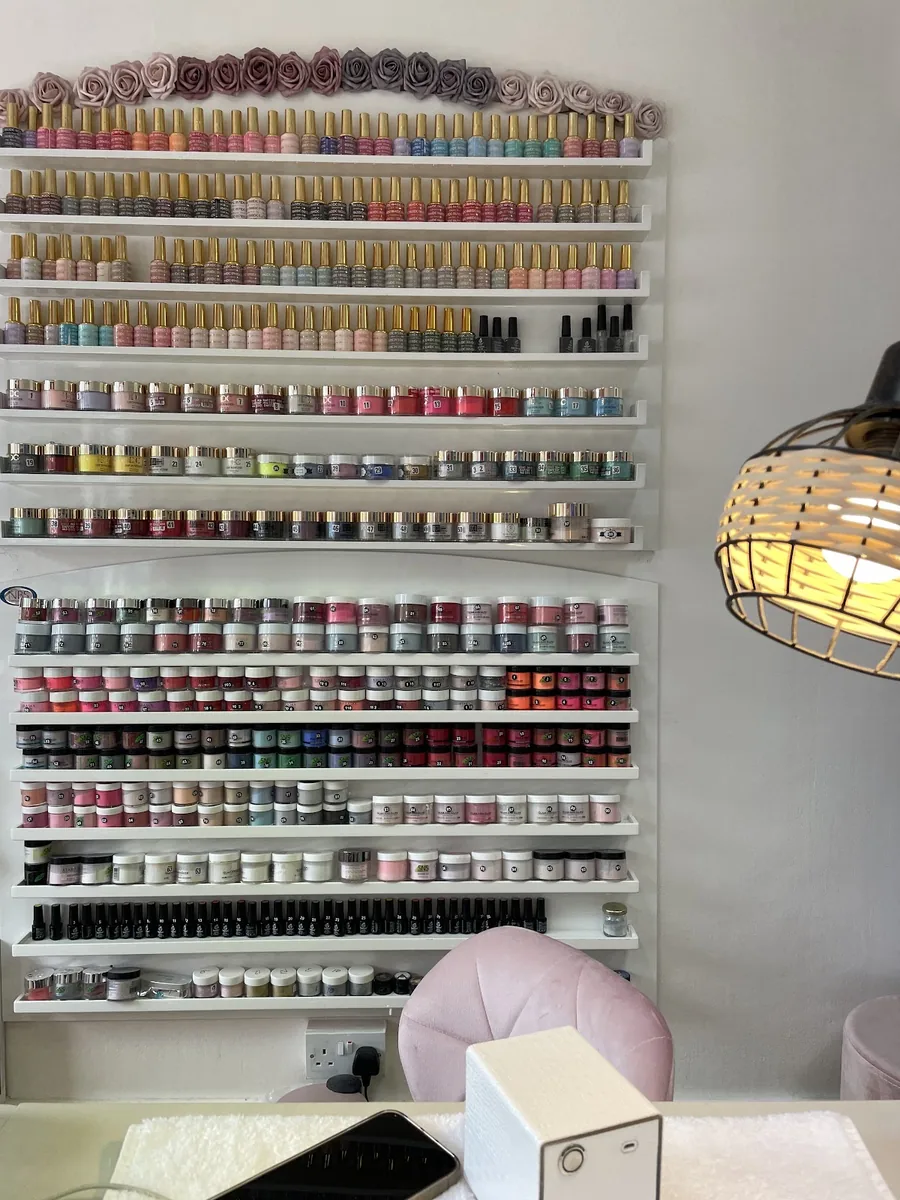 Close crop of the colour wall, rows of gel bottles to choose from
